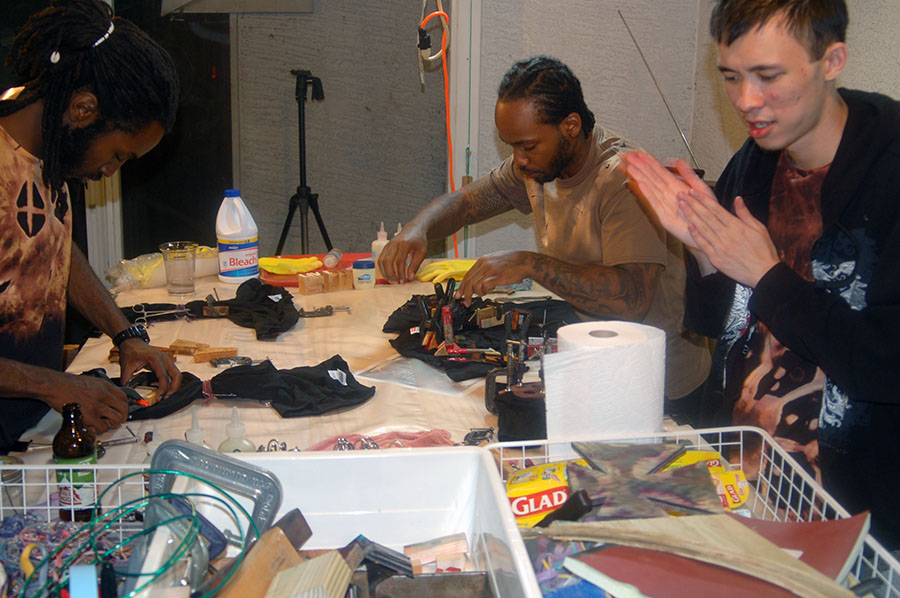 New dyers (but old souls) Judah (left) and Justin work with Craig at a Funshop